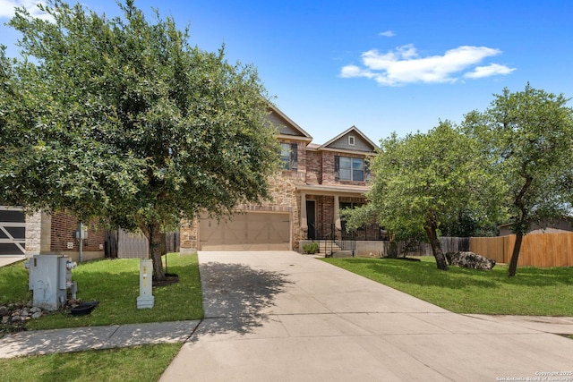 120 Red Bud, Boerne, TX 78006 - view of front of property with driveway, a garage, and stone siding