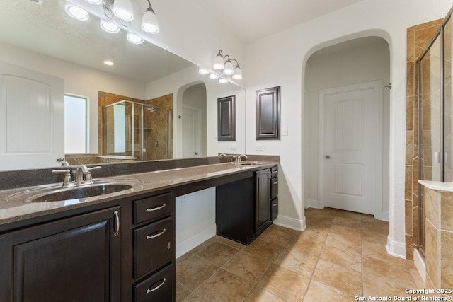 120 Red Bud, Boerne, TX 78006 - bathroom featuring a shower stall and double vanity
