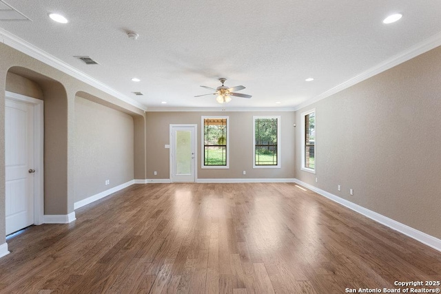 120 Red Bud, Boerne, TX 78006 - unfurnished room with ornamental molding, wood finished floors, ceiling fan, a smoke detector, and a textured ceiling