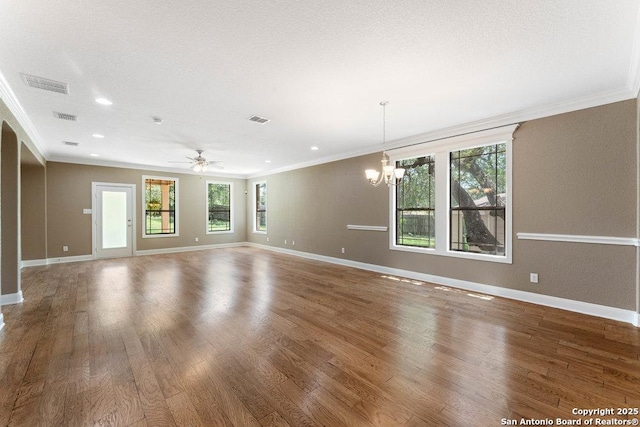 120 Red Bud, Boerne, TX 78006 - unfurnished living room with ornamental molding, wood finished floors, a chandelier, recessed lighting, and a ceiling fan