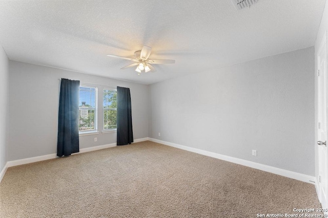 120 Red Bud, Boerne, TX 78006 - unfurnished room featuring a ceiling fan, light carpet, and a textured ceiling
