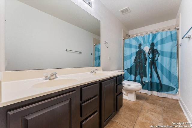 120 Red Bud, Boerne, TX 78006 - bathroom featuring double vanity, tile patterned flooring, and a shower with curtain