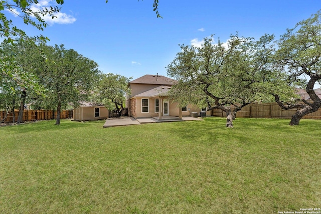 120 Red Bud, Boerne, TX 78006 - fenced backyard with a storage shed and a patio