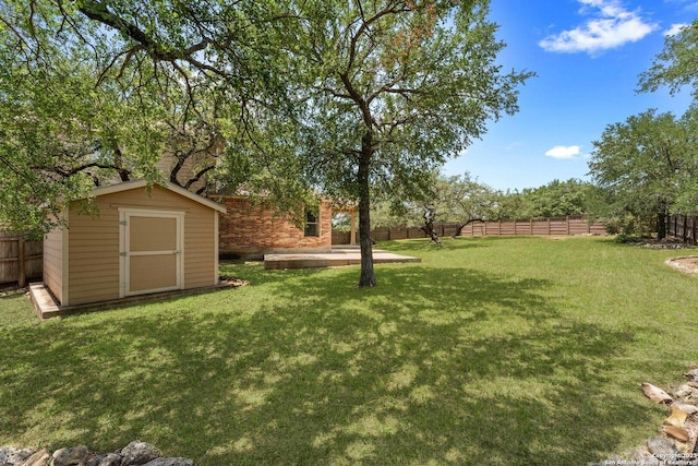 120 Red Bud, Boerne, TX 78006 - fenced backyard featuring a storage unit