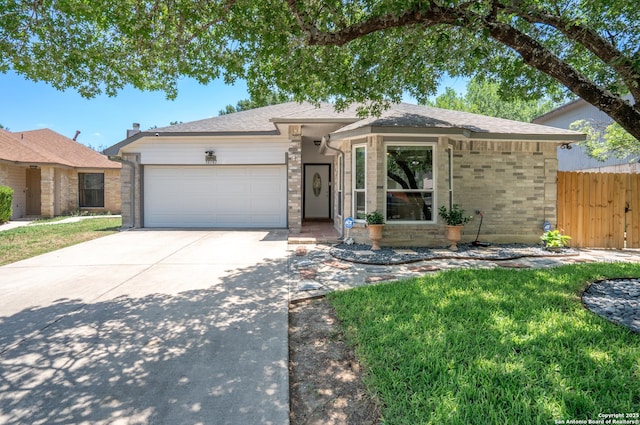 10707 Lake Path, San Antonio, TX 78217 - ranch-style house featuring an attached garage, driveway, and brick siding