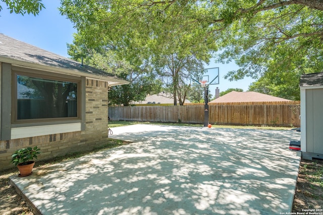 10707 Lake Path, San Antonio, TX 78217 - view of patio / terrace featuring basketball court