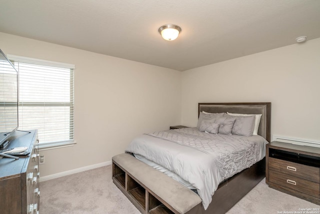 4951 Ranahan Pass, Saint Hedwig, TX 78152 - bedroom with light carpet and baseboards