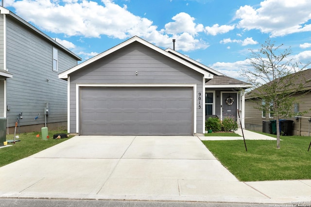 9015 Lunar Cv, San Antonio, TX 78252 - single story home featuring concrete driveway, a front yard, and a garage