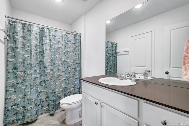 9015 Lunar Cv, San Antonio, TX 78252 - bathroom featuring vanity, recessed lighting, and a shower with curtain