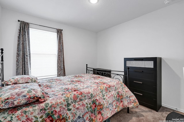 9015 Lunar Cv, San Antonio, TX 78252 - carpeted bedroom featuring baseboards
