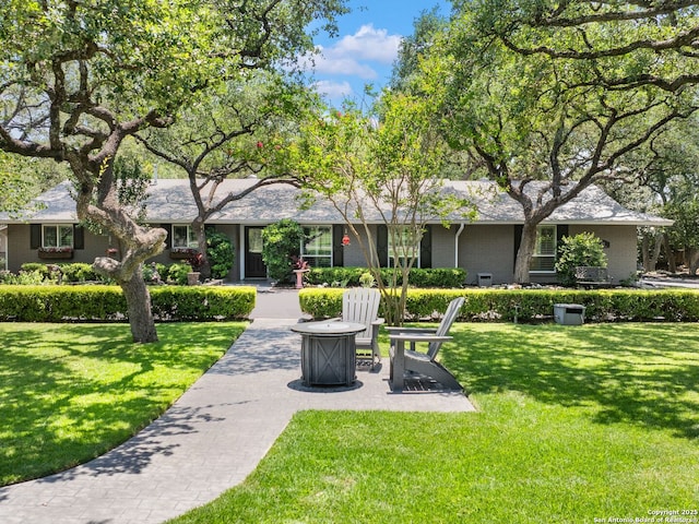132 Wagon Trail Rd, Shavano Park, TX 78231 - view of property's community with a lawn and an outdoor fire pit
