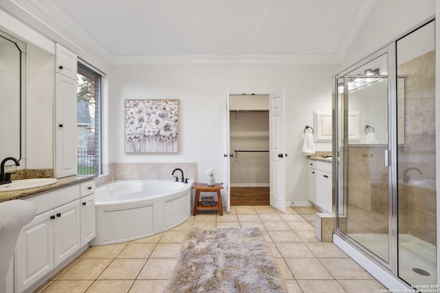 20907 Cactus Peak, San Antonio, TX 78258 - full bathroom with vanity, a shower stall, a bath, crown molding, and tile patterned flooring