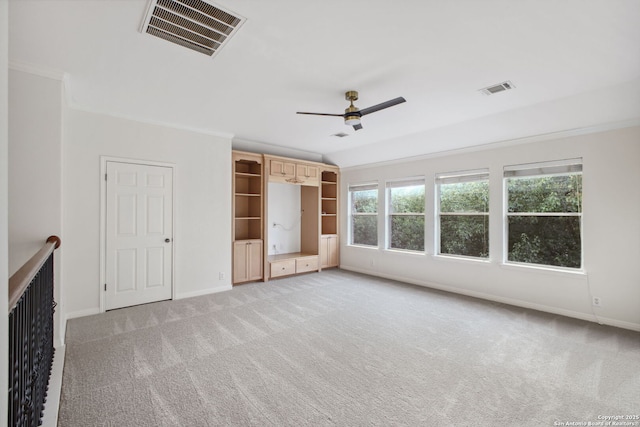20907 Cactus Peak, San Antonio, TX 78258 - unfurnished bedroom featuring light colored carpet, crown molding, and a ceiling fan