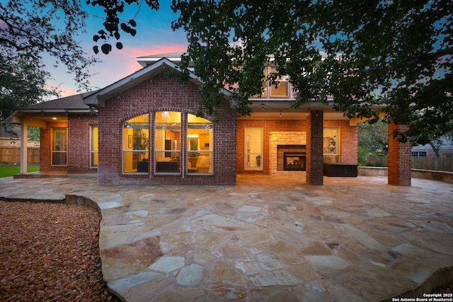 20907 Cactus Peak, San Antonio, TX 78258 - back of property with a patio area and brick siding