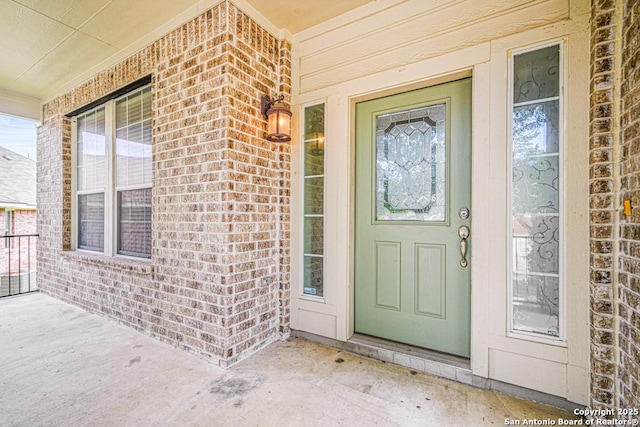 223 Verde Blf, San Antonio, TX 78258 - entrance to property featuring brick siding and a porch