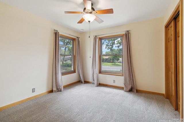 4722 Hollyridge, San Antonio, TX 78228 - empty room featuring plenty of natural light, light colored carpet, and ceiling fan
