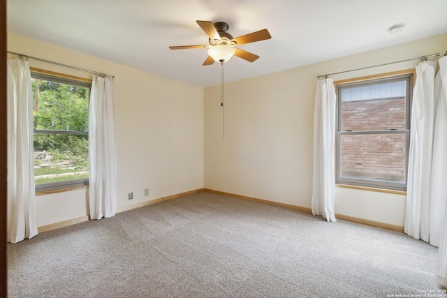 4722 Hollyridge, San Antonio, TX 78228 - empty room featuring a ceiling fan, light carpet, and a smoke detector