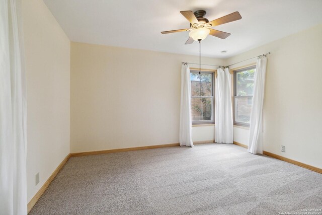 4722 Hollyridge, San Antonio, TX 78228 - empty room featuring light carpet and a ceiling fan