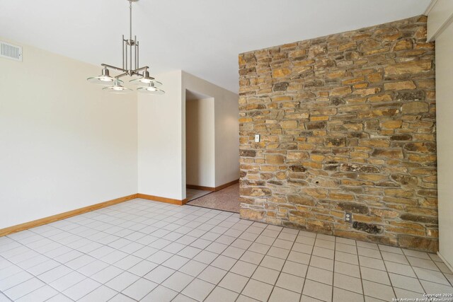 4722 Hollyridge, San Antonio, TX 78228 - empty room with light tile patterned floors and a chandelier