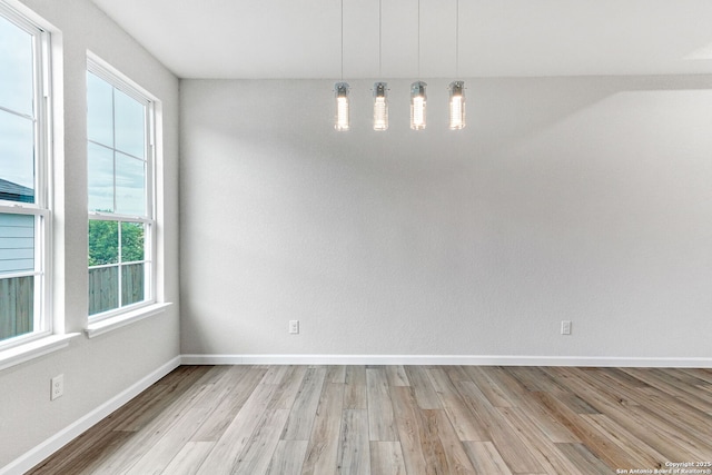 9911 Loma Alta Cir, Converse, TX 78109 - unfurnished dining area with healthy amount of natural light and light wood-style floors