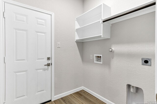 9911 Loma Alta Cir, Converse, TX 78109 - washroom with wood finished floors, washer hookup, electric dryer hookup, and gas dryer hookup