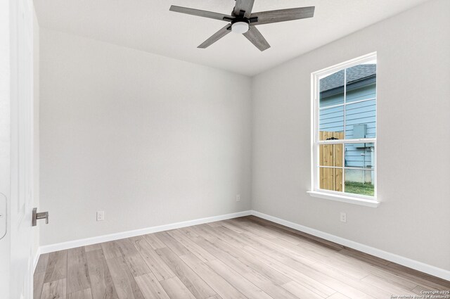 9911 Loma Alta Cir, Converse, TX 78109 - empty room with light wood-style flooring and ceiling fan