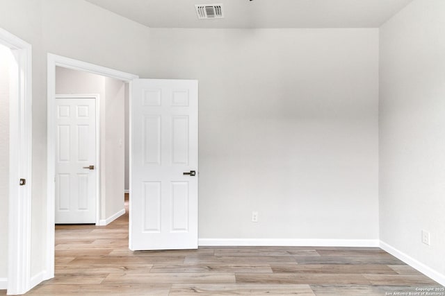 9911 Loma Alta Cir, Converse, TX 78109 - unfurnished bedroom featuring light wood-style flooring and baseboards