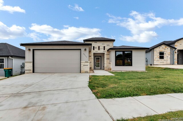 9911 Loma Alta Cir, Converse, TX 78109 - view of front facade featuring stone siding, driveway, an attached garage, and a front lawn