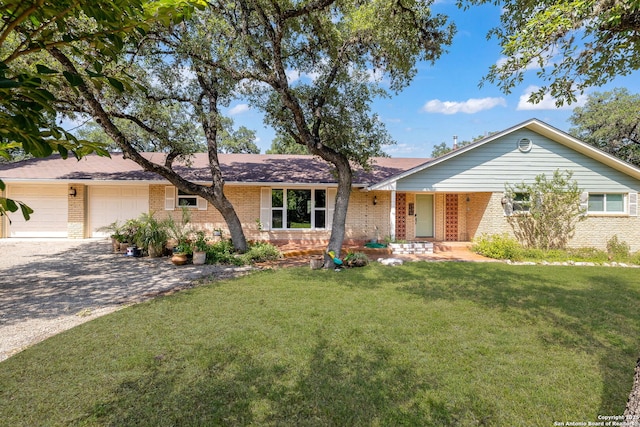 10567 Rocking M, Helotes, TX 78023 - ranch-style home with brick siding, an attached garage, driveway, and a front lawn