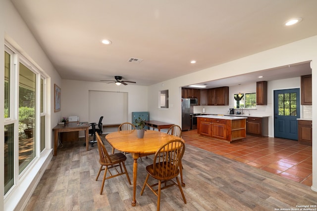 10567 Rocking M, Helotes, TX 78023 - tiled dining area featuring recessed lighting and a ceiling fan