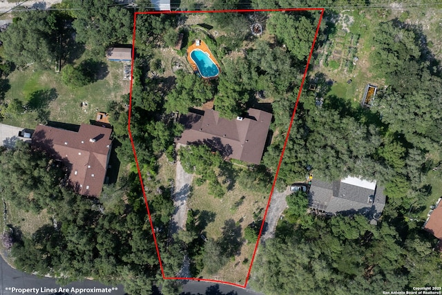 10567 Rocking M, Helotes, TX 78023 - aerial view of property and surrounding area featuring property boundaries highlighted