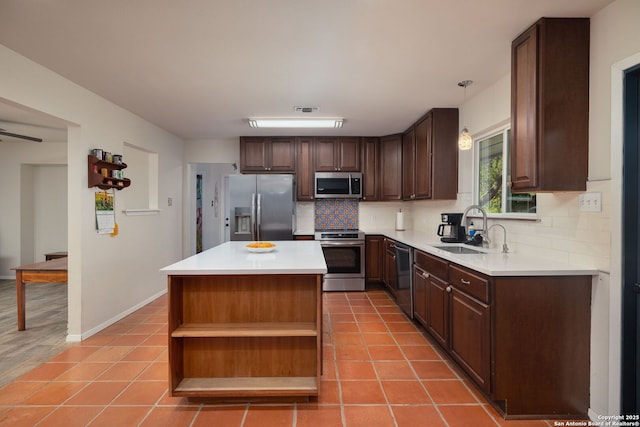 10567 Rocking M, Helotes, TX 78023 - kitchen with stainless steel appliances, open shelves, decorative backsplash, light tile patterned flooring, and dark brown cabinetry