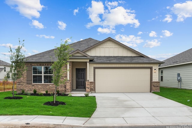 13519 Beebrush Saddle, San Antonio, TX 78253 - view of front of property featuring brick siding, an attached garage, concrete driveway, a front yard, and board and batten siding