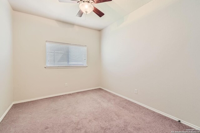 26215 Presidio Blf, Boerne, TX 78015 - carpeted empty room featuring a ceiling fan and baseboards