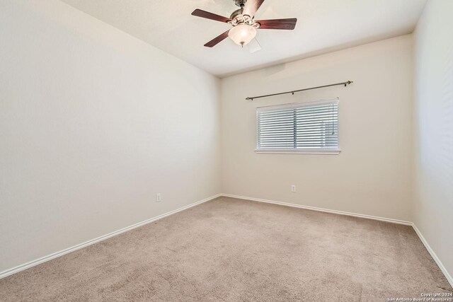26215 Presidio Blf, Boerne, TX 78015 - carpeted spare room featuring baseboards and ceiling fan