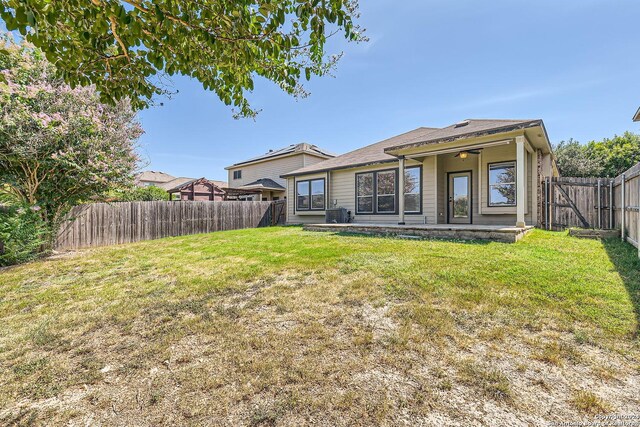 26215 Presidio Blf, Boerne, TX 78015 - rear view of property with a fenced backyard