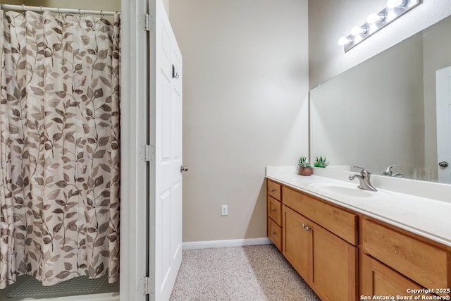 6160 Eckhert Rd, San Antonio, TX 78240 - full bath featuring vanity, speckled floor, and a shower with curtain