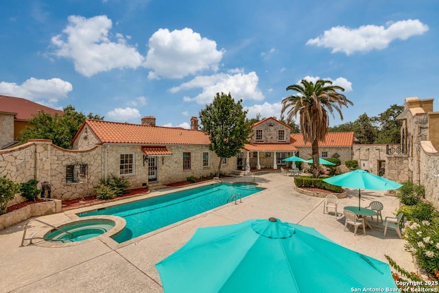 6160 Eckhert Rd, San Antonio, TX 78240 - view of swimming pool with a patio and a pool with connected hot tub