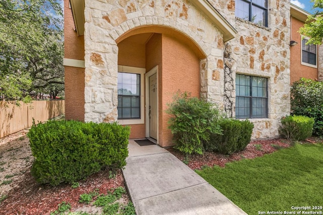6160 Eckhert Rd, San Antonio, TX 78240 - doorway to property with stone siding and stucco siding
