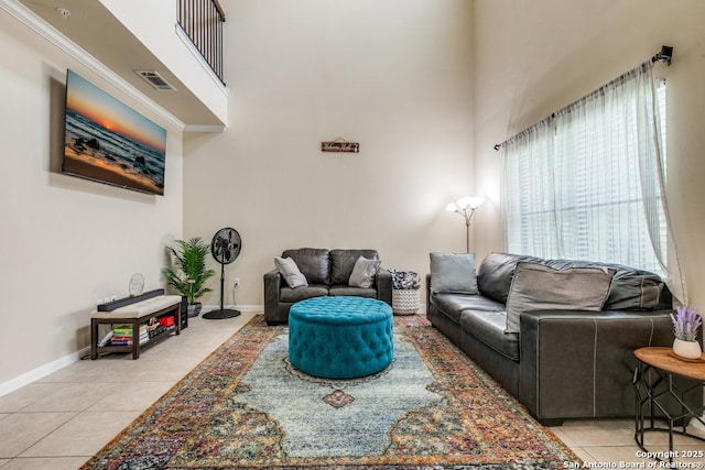 6160 Eckhert Rd, San Antonio, TX 78240 - living area with light tile patterned flooring and a towering ceiling