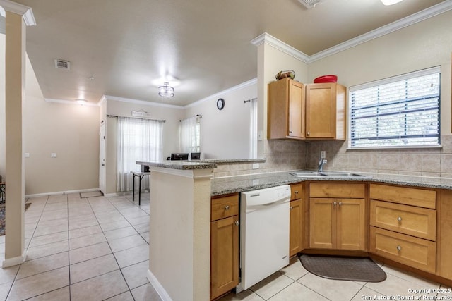 6160 Eckhert Rd, San Antonio, TX 78240 - kitchen with white dishwasher, crown molding, decorative backsplash, light tile patterned flooring, and plenty of natural light
