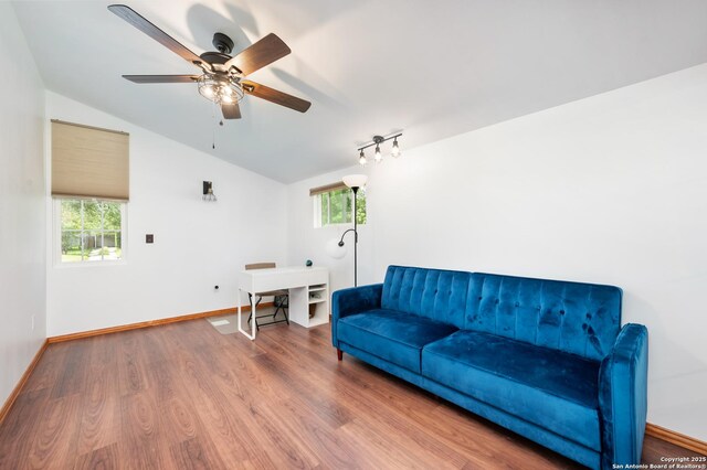 227 Devonshire, San Antonio, TX 78209 - living room with vaulted ceiling, wood finished floors, and a ceiling fan