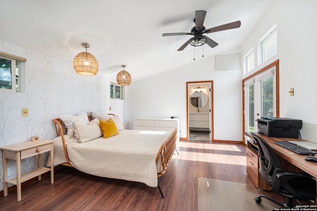 227 Devonshire, San Antonio, TX 78209 - bedroom featuring dark wood finished floors, a desk, vaulted ceiling, and ensuite bath
