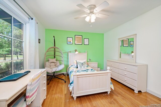 227 Devonshire, San Antonio, TX 78209 - bedroom featuring multiple windows, light wood-style flooring, and ceiling fan