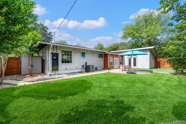 227 Devonshire, San Antonio, TX 78209 - rear view of property with french doors and a patio area