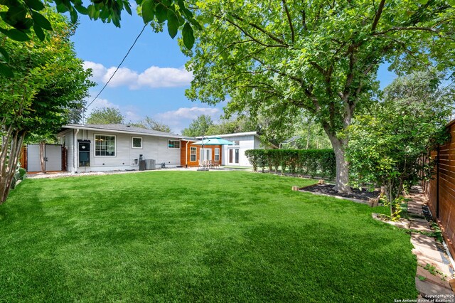 227 Devonshire, San Antonio, TX 78209 - fenced backyard with a patio