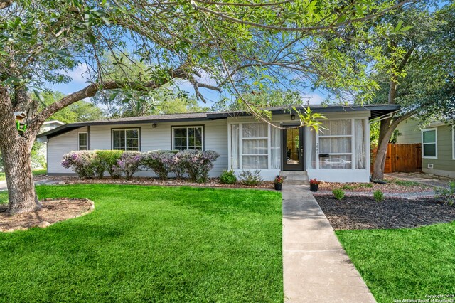 227 Devonshire, San Antonio, TX 78209 - ranch-style house featuring a sunroom