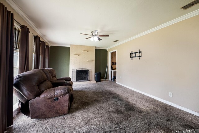 503 E Palfrey, San Antonio, TX 78223 - carpeted living room with ceiling fan, crown molding, and a fireplace