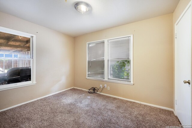 503 E Palfrey, San Antonio, TX 78223 - unfurnished room with carpet flooring and plenty of natural light