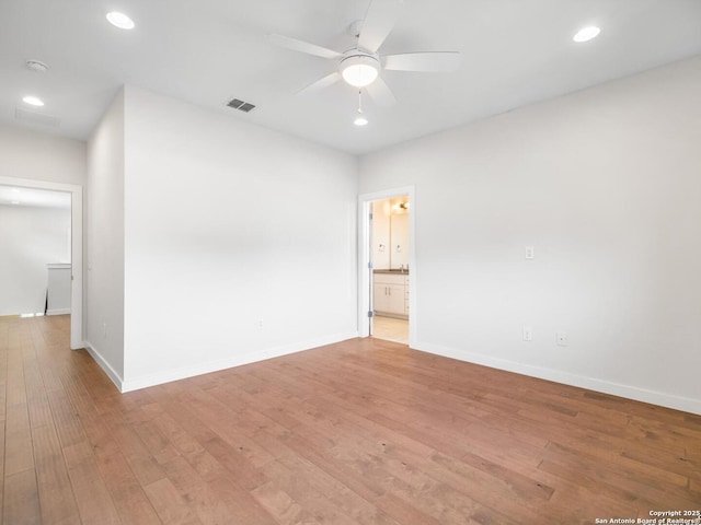 338 E Olmos, San Antonio, TX 78212 - unfurnished room with light wood-type flooring, a ceiling fan, and recessed lighting